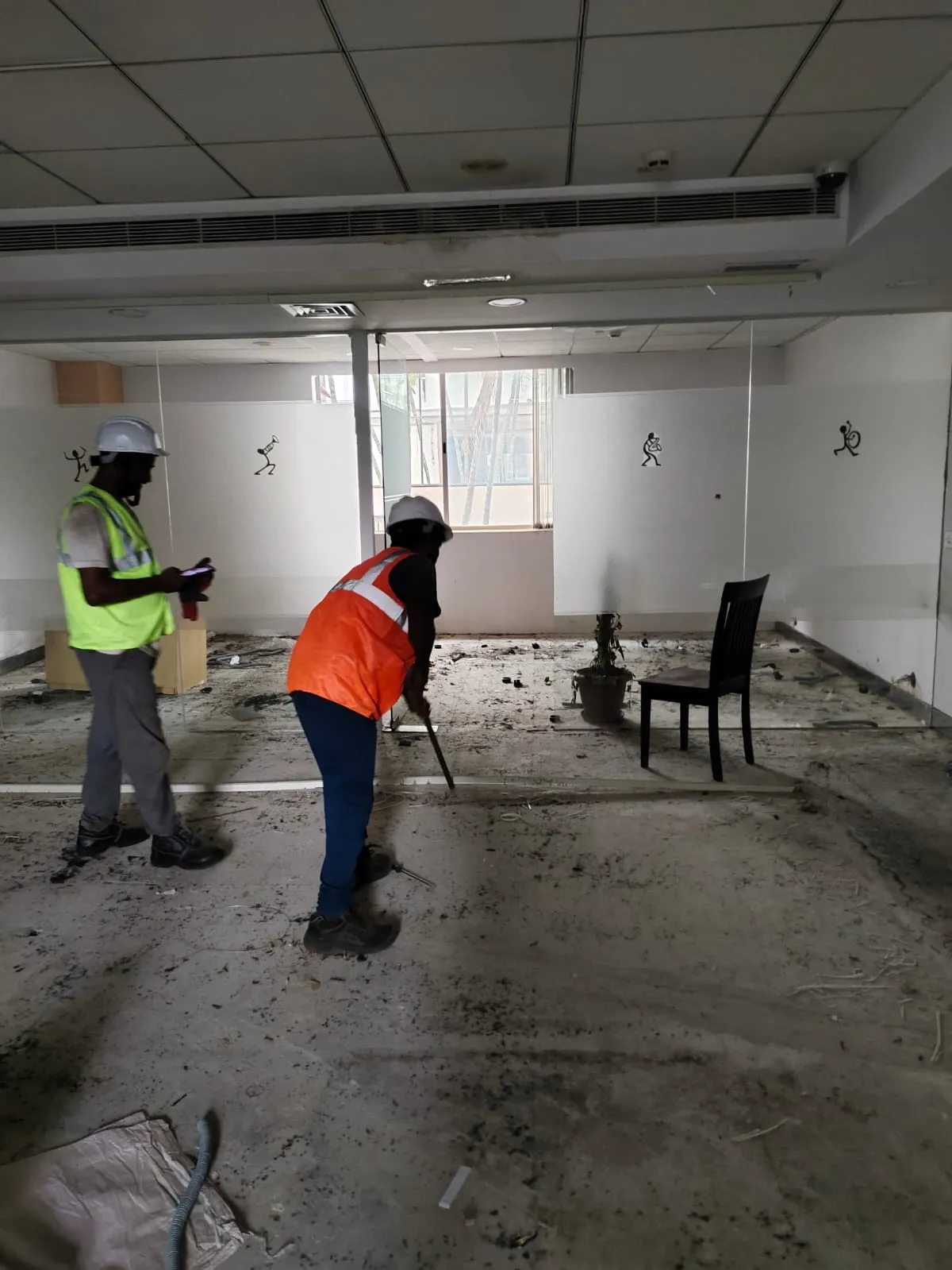 Professional technicians performing complete office dismantling services in Bellandur inside a large commercial technology park